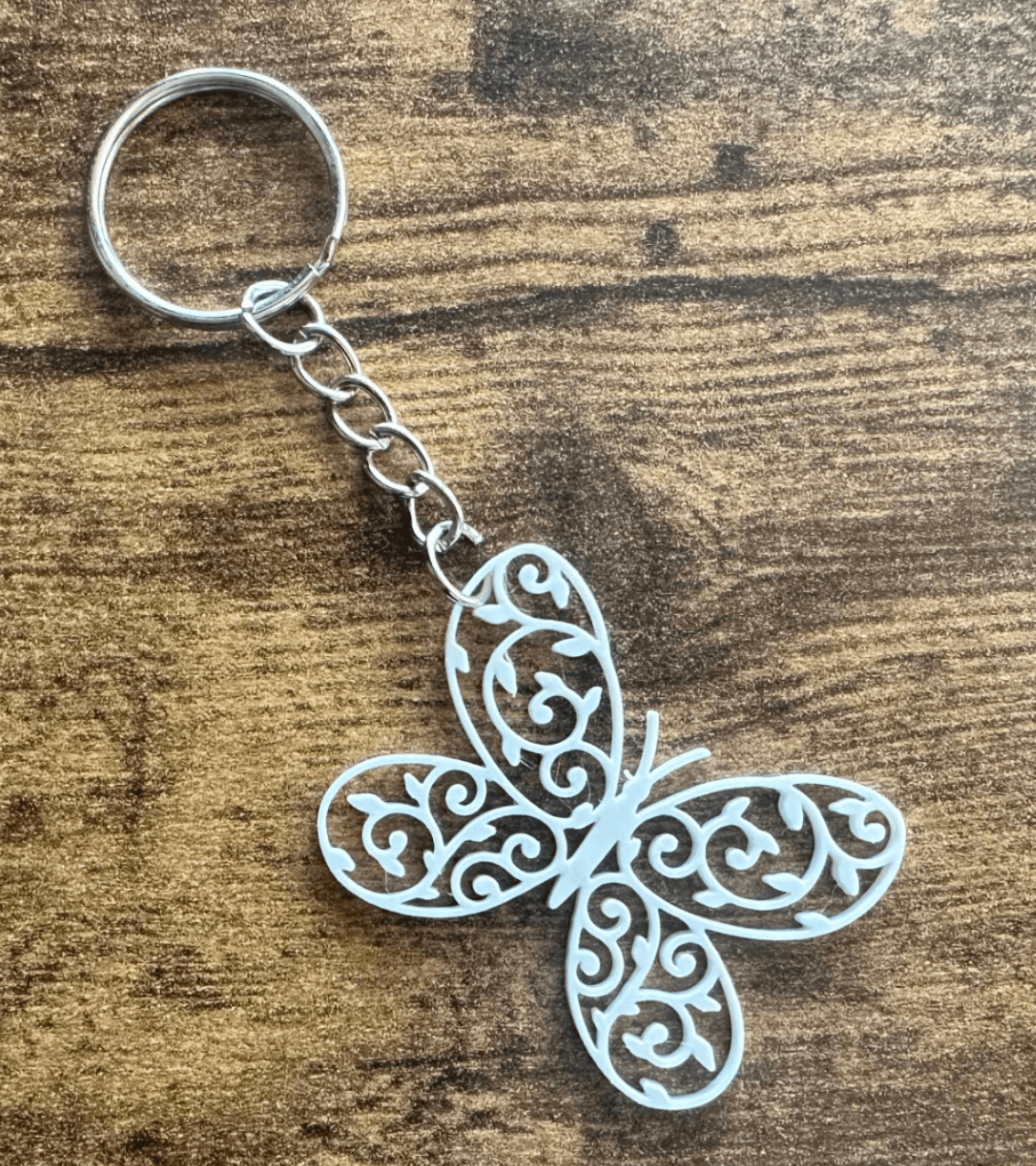 Llavero con forma de mariposa